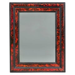 A fine red tortoiseshell pier mirror 