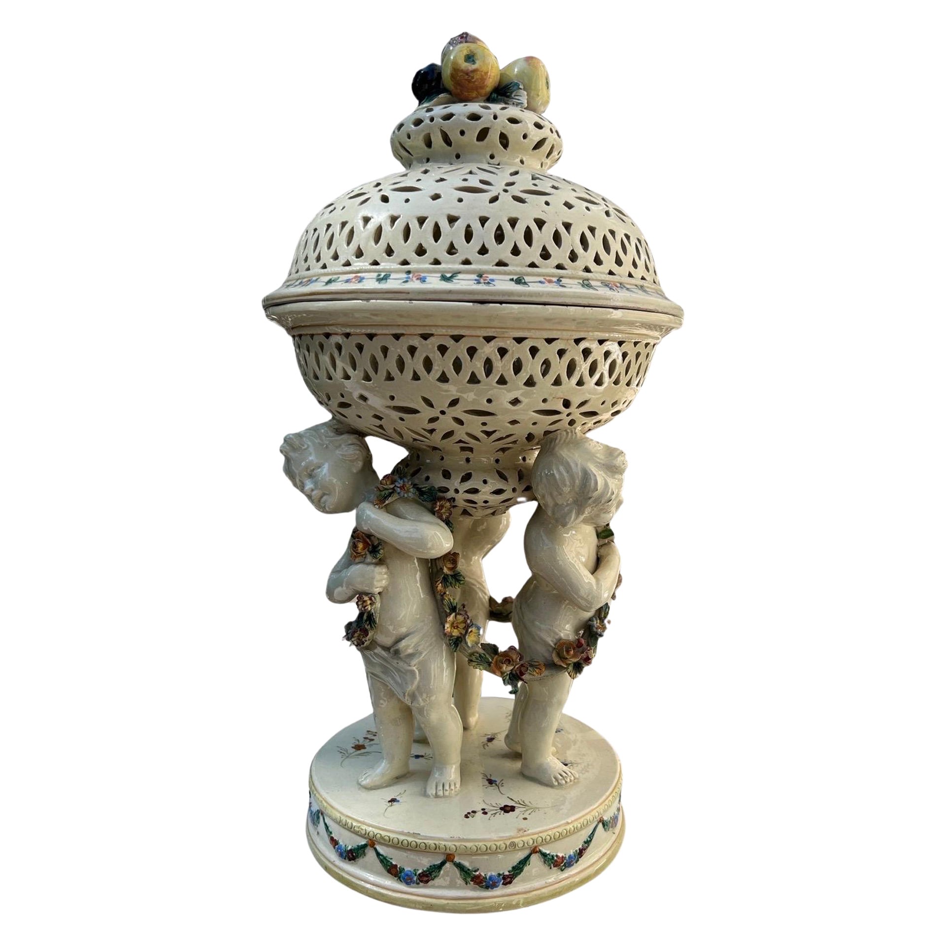 19th Century French Tin Glazed Creamware Centerpiece Adorned With Putti Supports For Sale