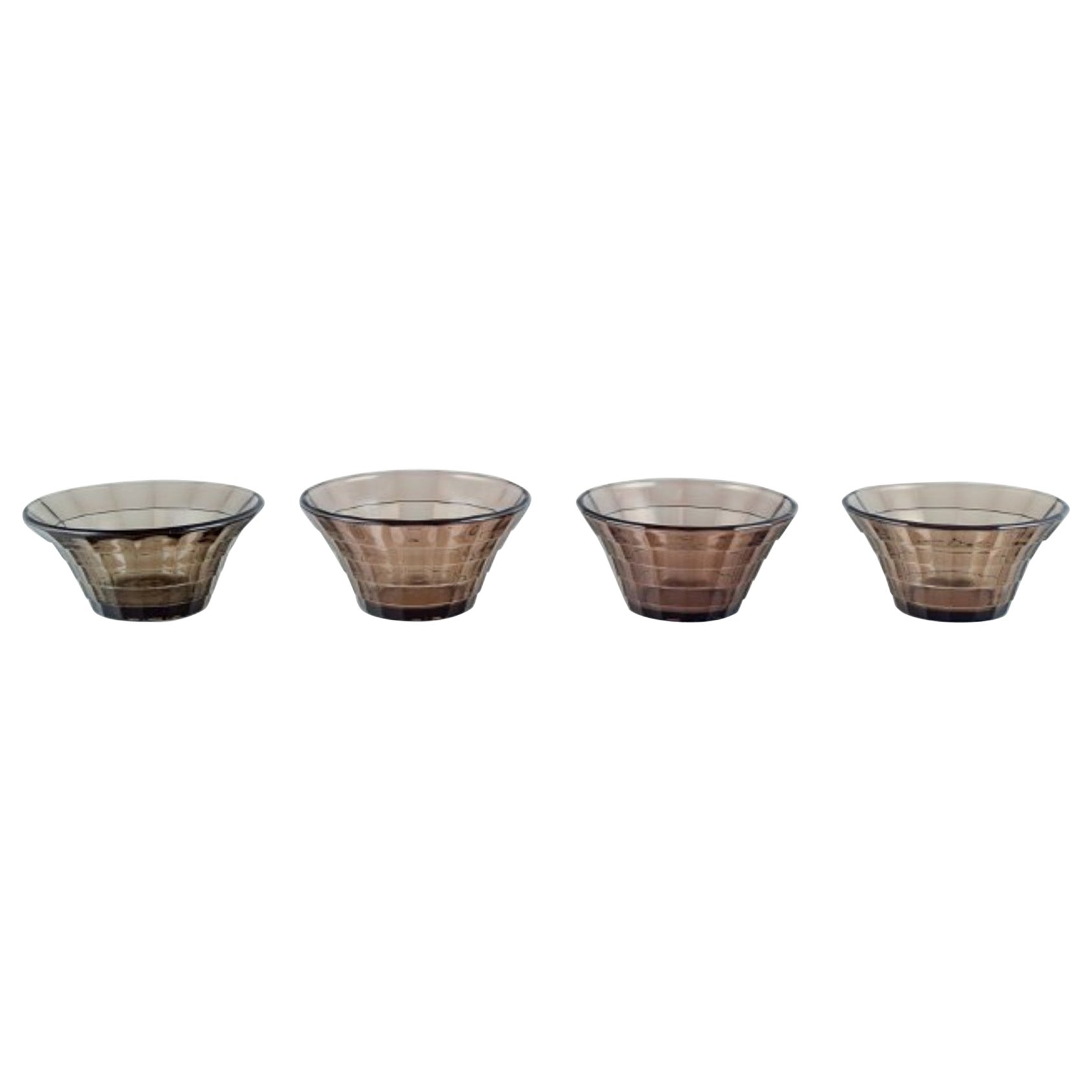 Simon Gate for Orrefors/Sandvik. Four bowls in smoked-coloured pressed glass For Sale