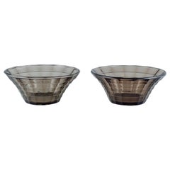 Simon Gate for Orrefors. Two large bowls in smoked-coloured pressed glass.