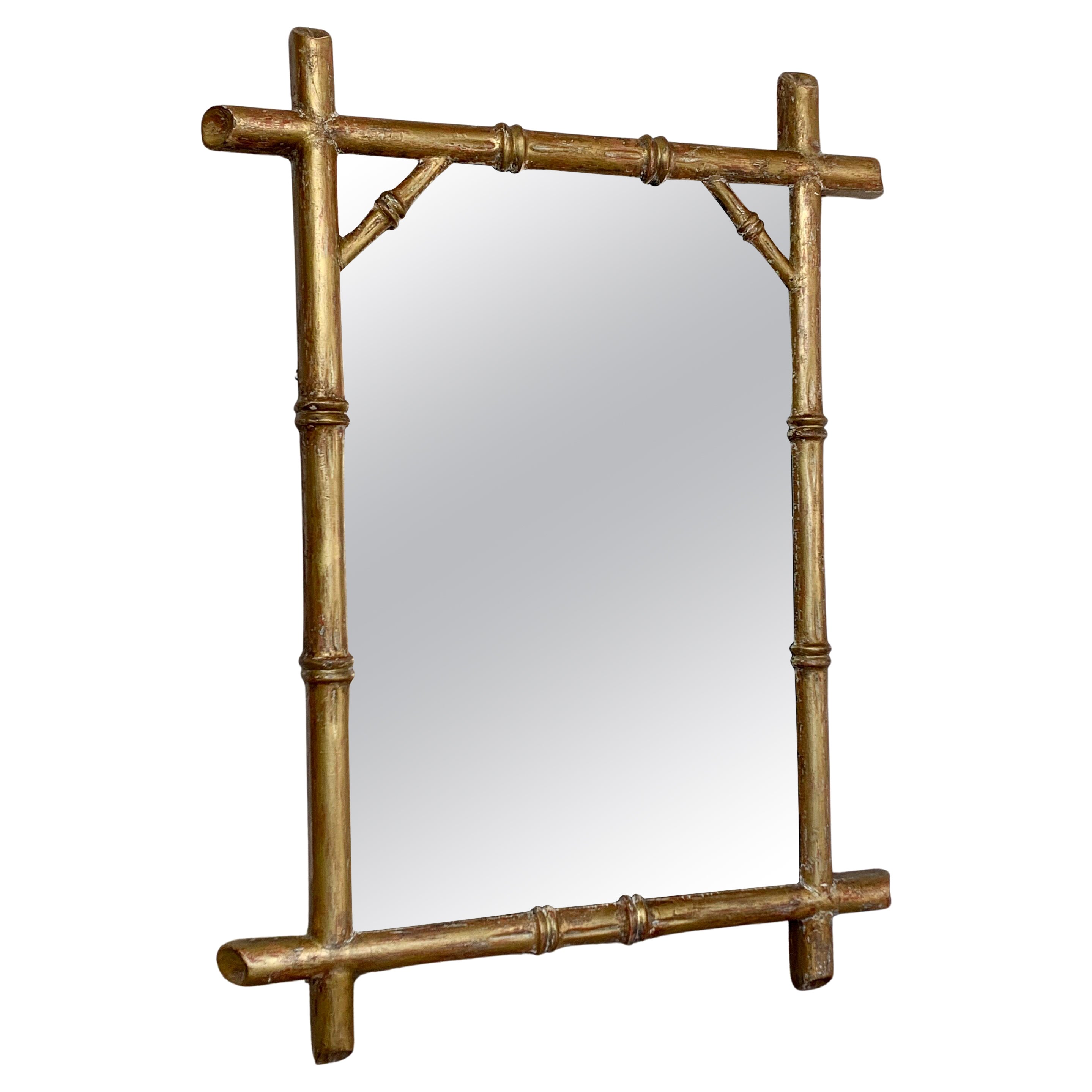 Miroir français du 19ème siècle en bois doré et faux bambou