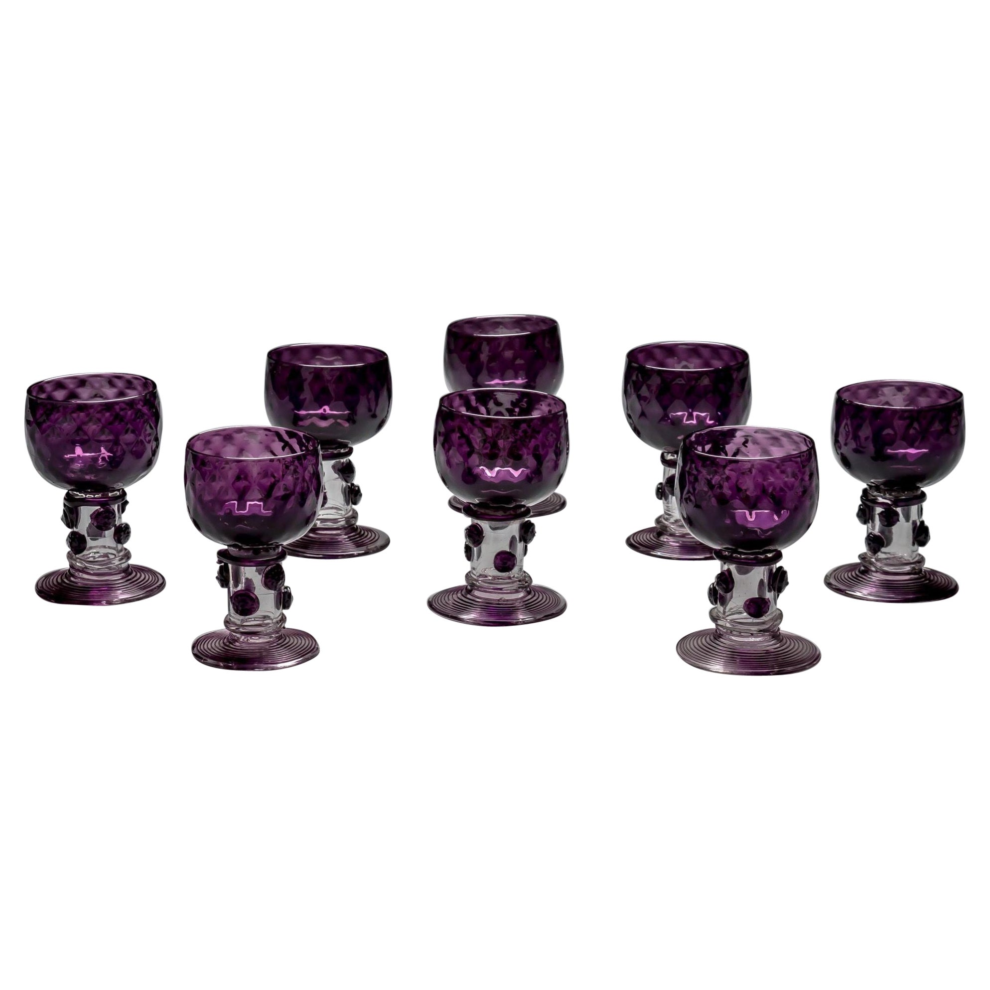 A Set Of Eight Amethyst Roemers 