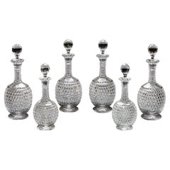 An Elaborately Cut Suite Of Decanter