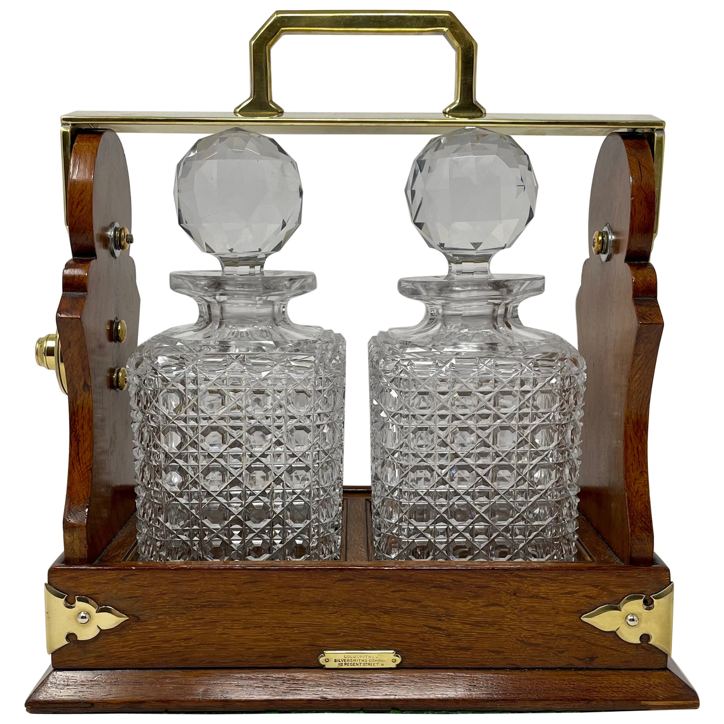 Antique English Golden Oak & Cut Crystal Two-Bottle Tantalus, Circa 1890.