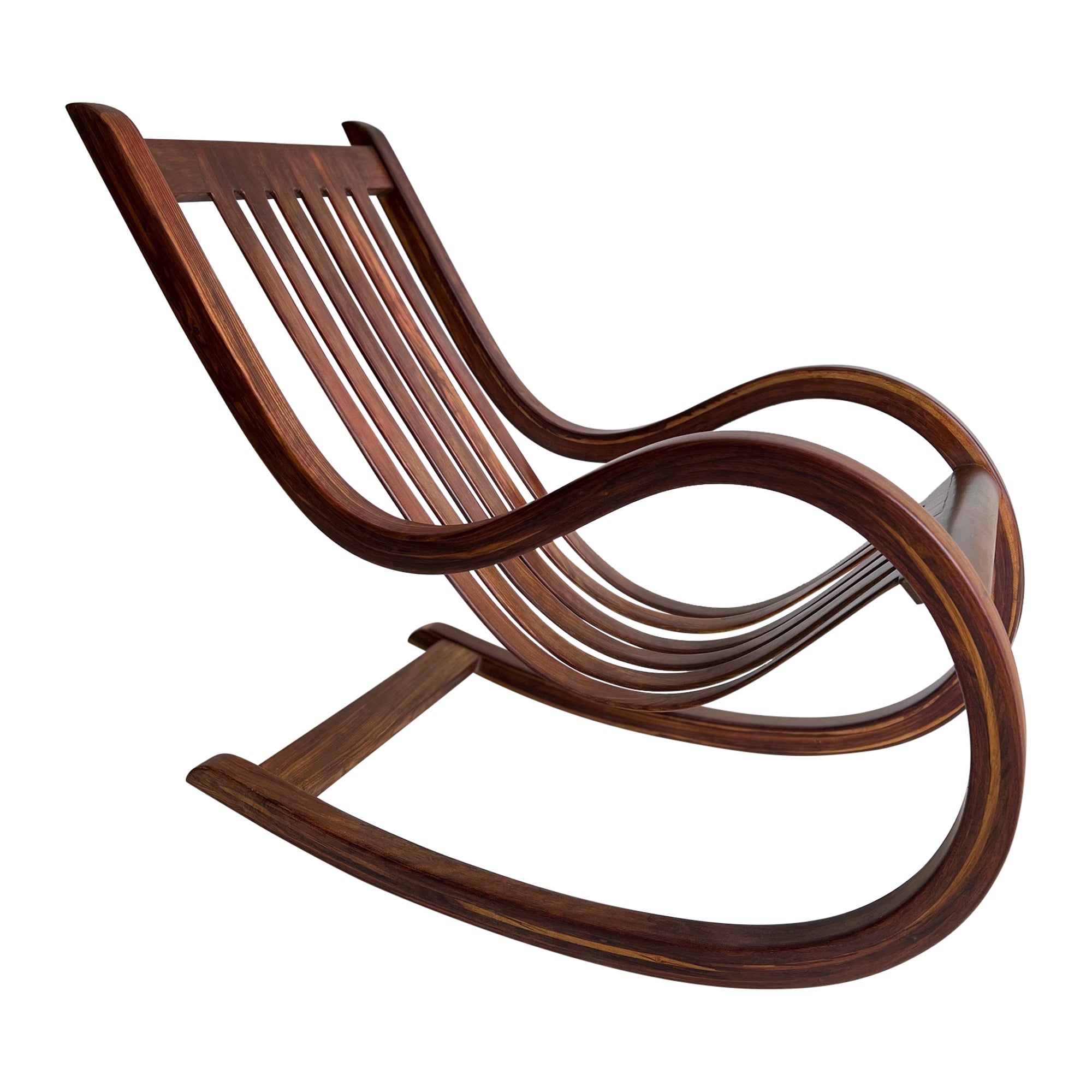 Salvador Vidal Vintage Cantilevered Rosewood Rocking Chair For Sale