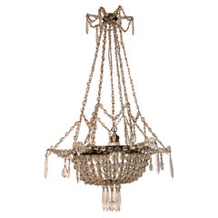 Early 20th Century French Iron and Crystal Chandelier.