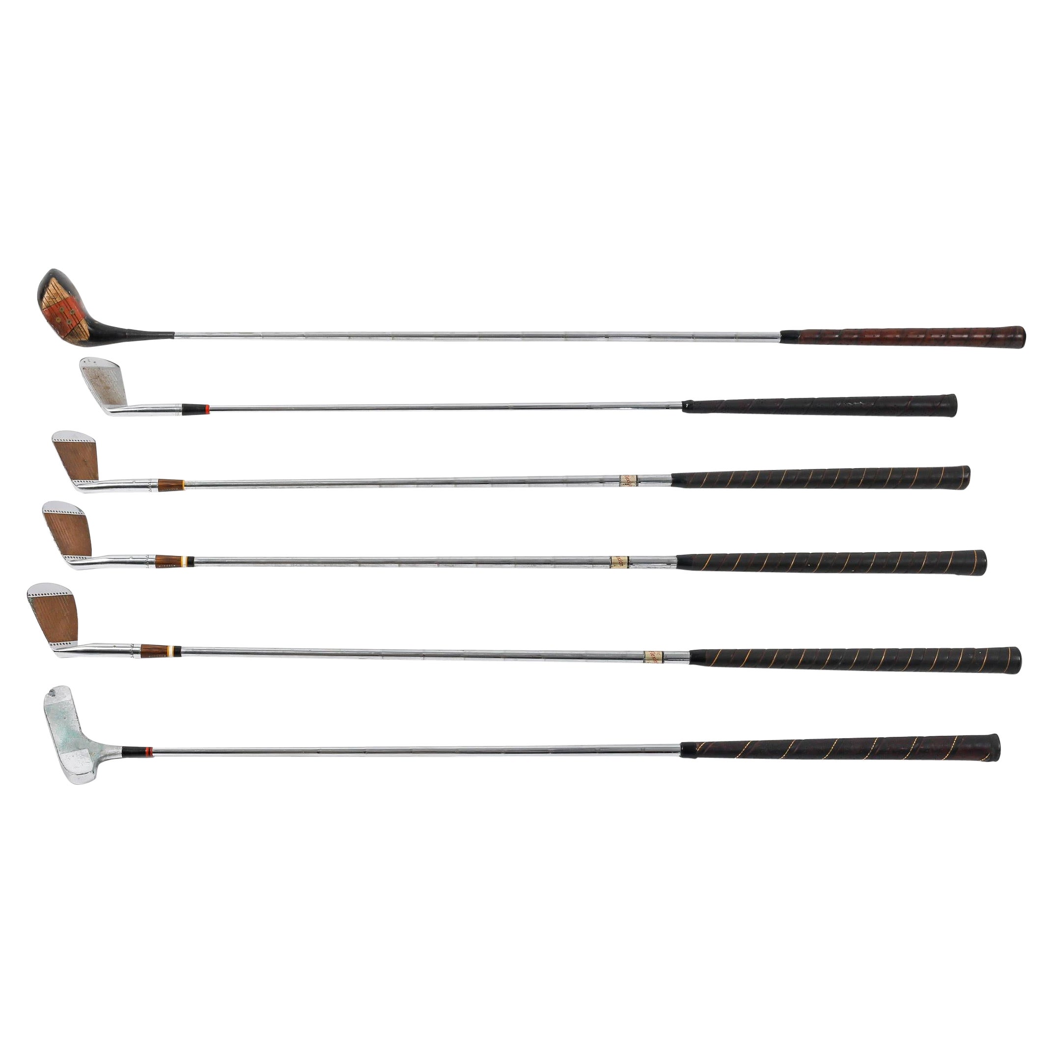 Suite of 6 Golf Clubs from the 1950s.