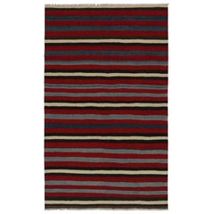 Rug & Kilim’s Afghan Tribal Kilim Rug in Red with Geometric Striped Patterns