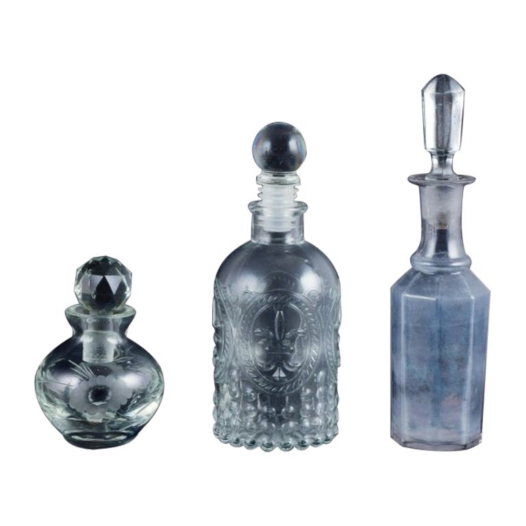 Danish glassworks, three oil/vinegar jugs in different designs. 1930/40s For Sale