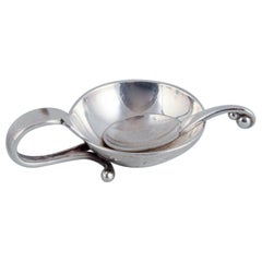 Georg Jensen Art Deco salt cellar with matching salt spoon in sterling silver.
