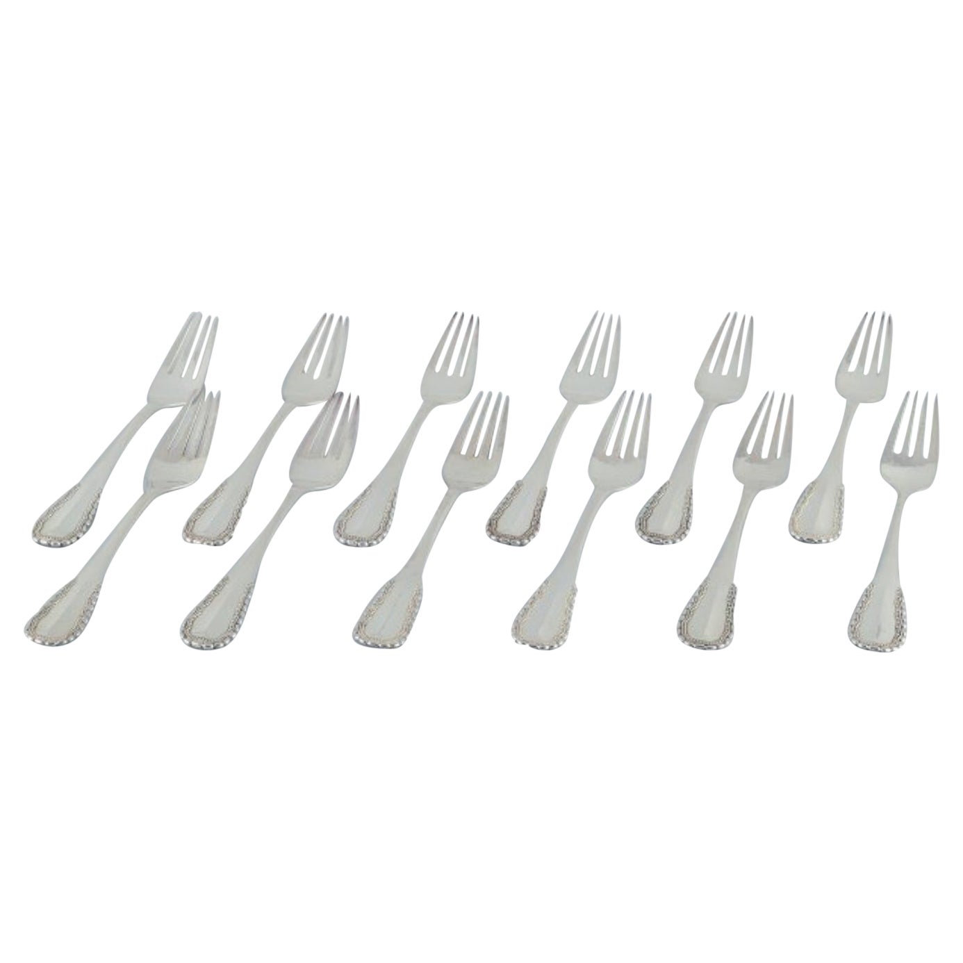 Georg Jensen, Viking,  twelve large dinner forks in silver and sterling silver For Sale