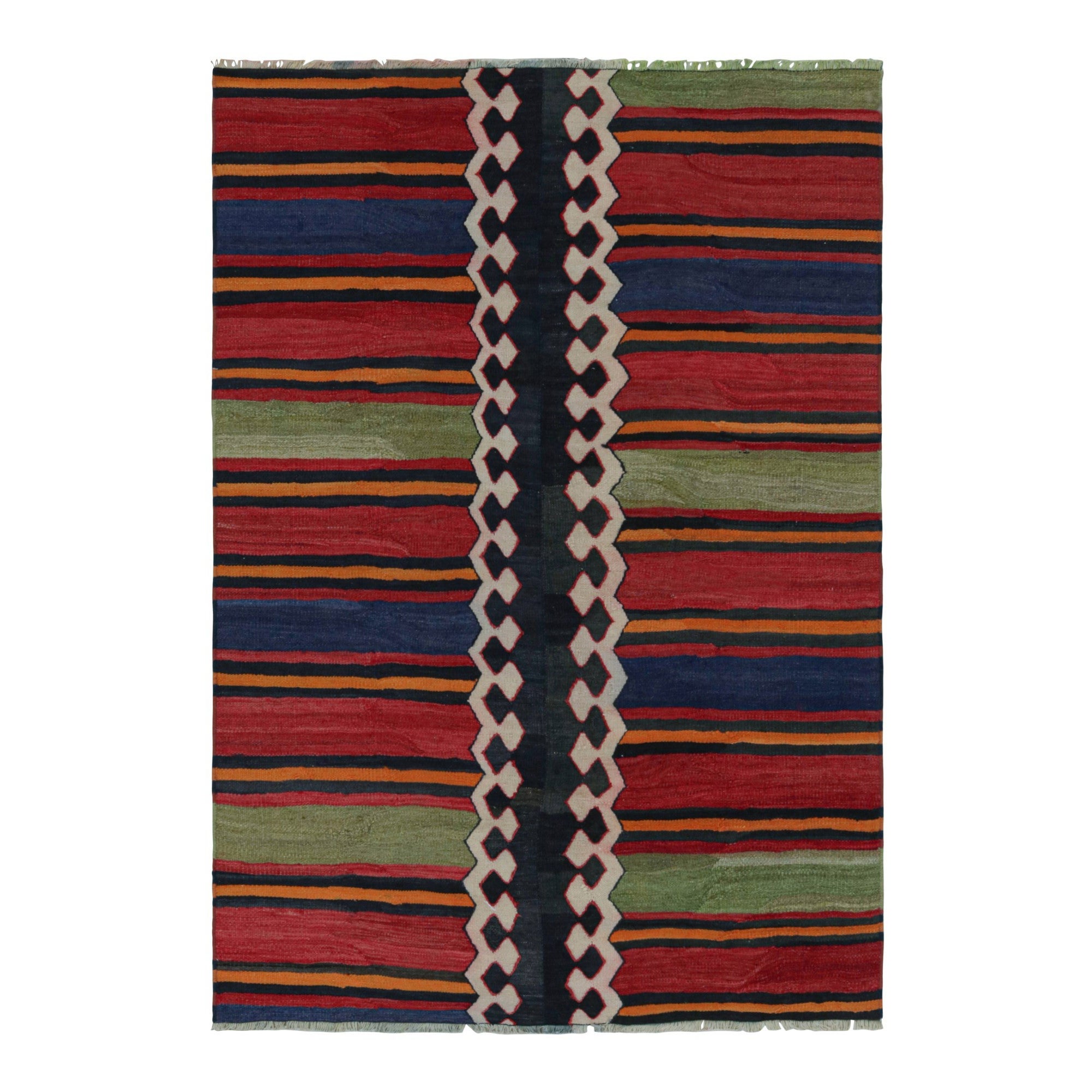 Tapis Kilim tribal vintage aux motifs géométriques polychromes par Rug & Kilim