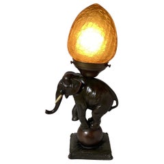 1930's Bronze Elephant Lamp With Amber Glass Shade