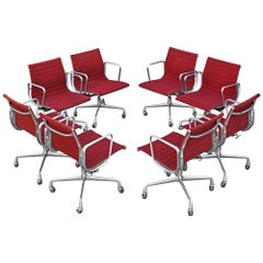 Set of Eight Charles Eames Herman Miller Aluminum Group Office Chairs, Burgundy