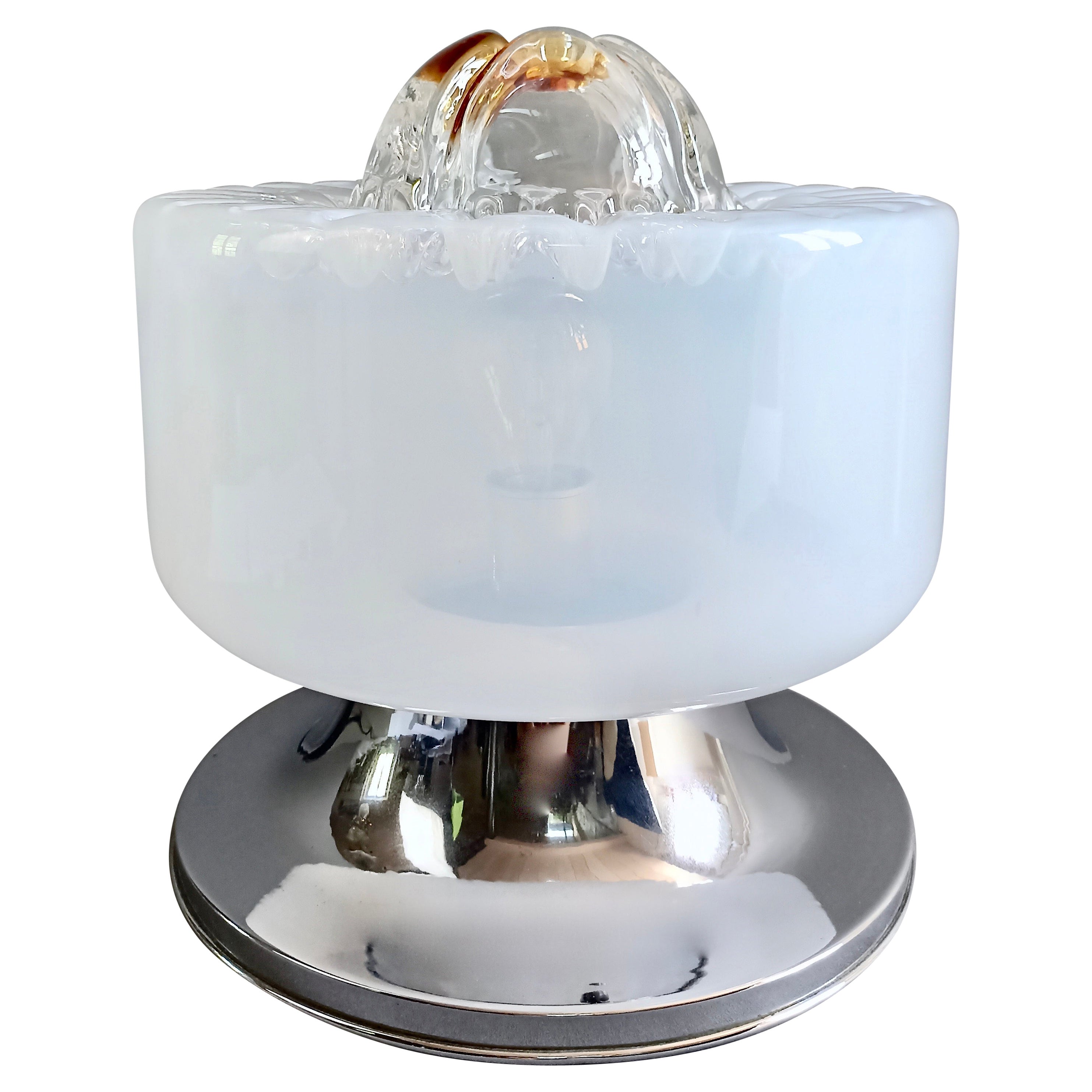 Beautiful and rare vintage Mazzega Murano art glass one-light table lamp from the 1970s. 
Hand-blown clear milky-white lampshade, enriched at the top by a fascinating 