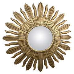 Miroir vintage doré en forme de soleil
