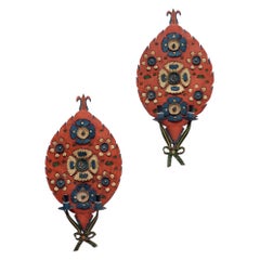 Pair of folk art sheet metal wall lamps, 1950s.