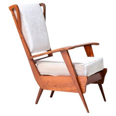 Modernist reading armchair with oak structure