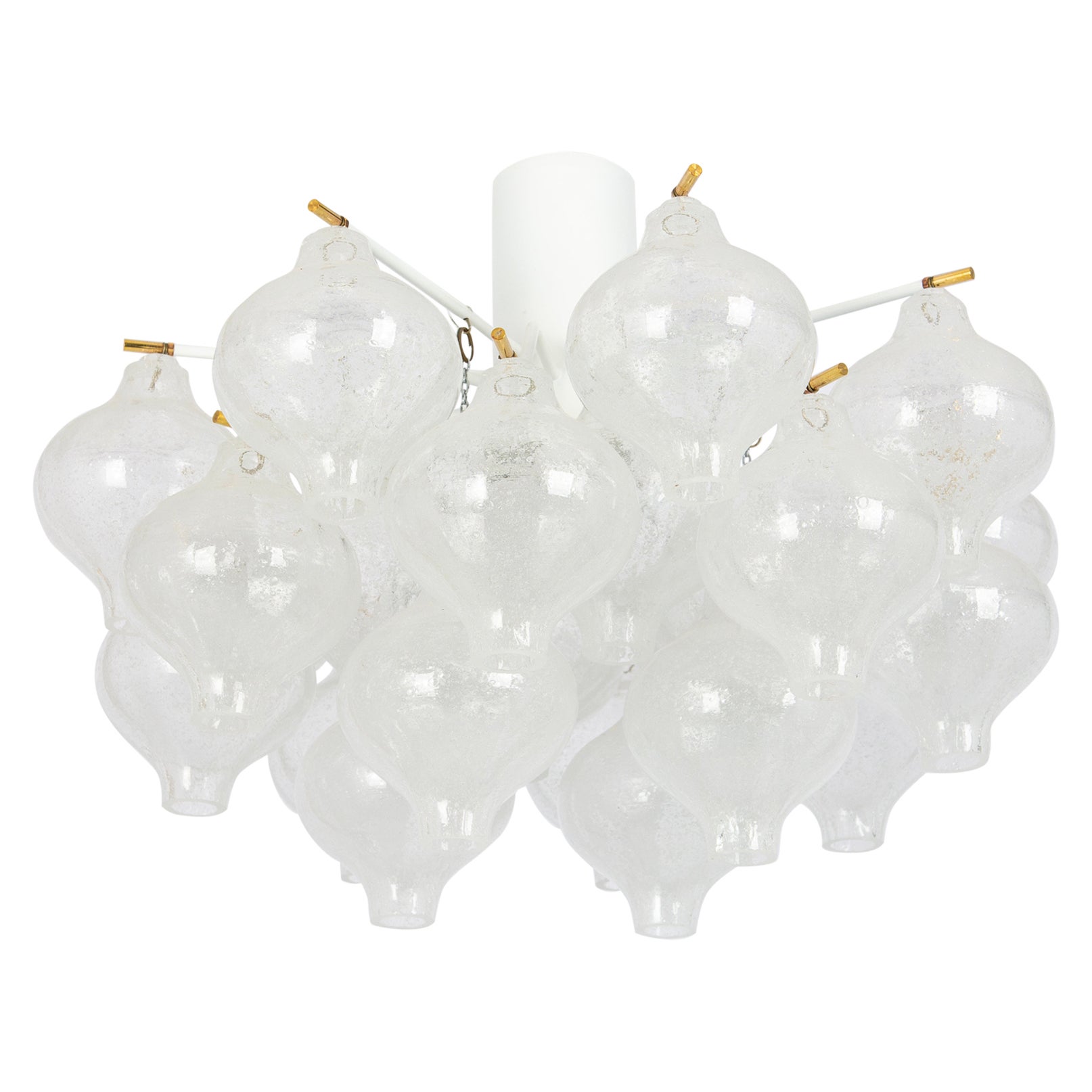 Wonderful onion-shaped -Tulipan glass Flush mount light. Twenty-four hand-blown glasses suspended on a white colored metal frame.
Best of design from the 1960s by Kalmar, Austria. High quality of the materials.
Beyond its practical function, the