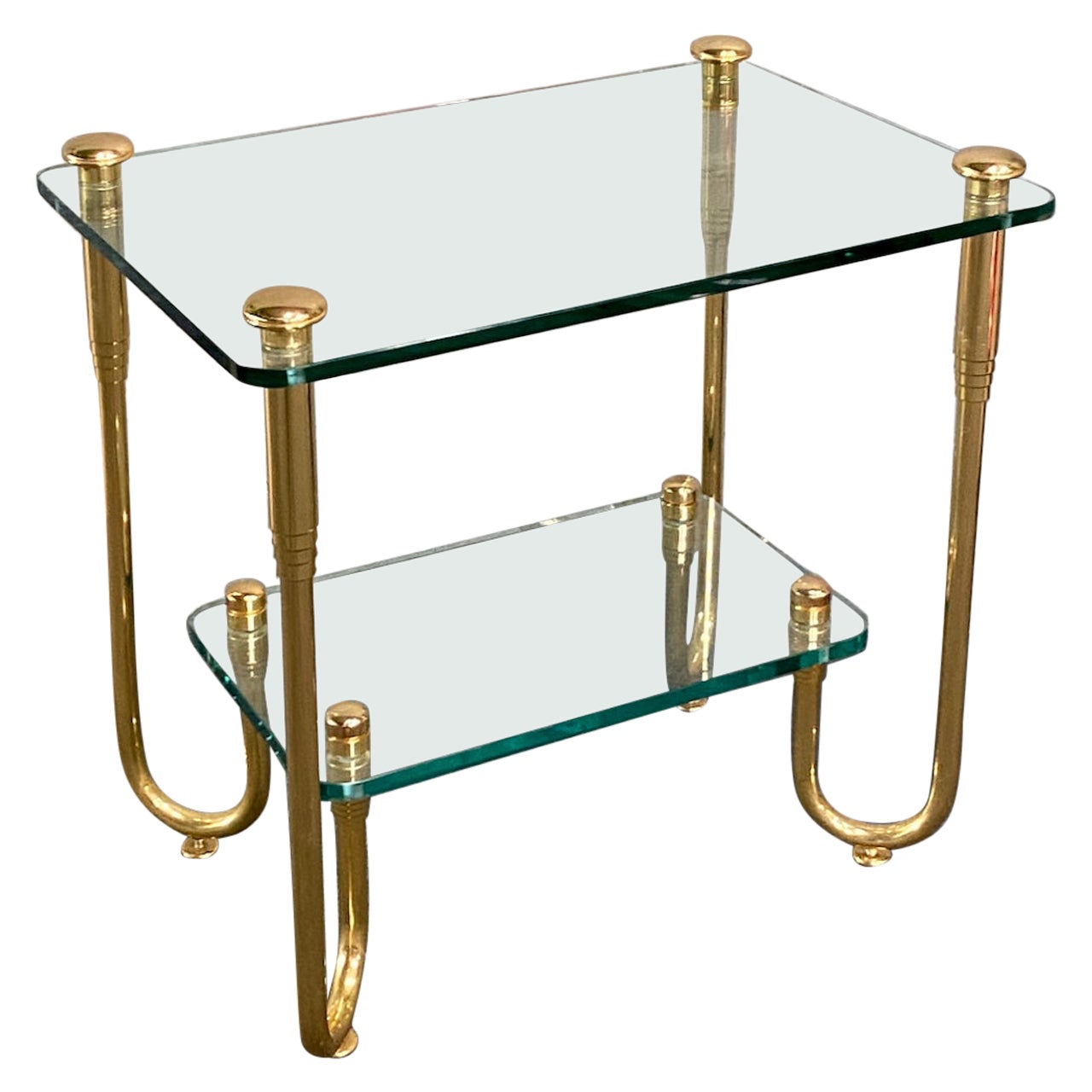 Hollywood Regency style gold plated glass side table For Sale