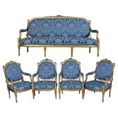 Antique Elegant French 19' Century Gilt Living Room Suite with a Sofa and Four Armchairs