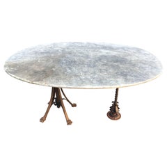Antique French Oval Marble Dining Table with Whimsical Iron Legs