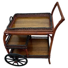 A Wicker Tea/Bar Cart with Serving Tray, Mid and Lower Shelf   W/ Bar Top Finish