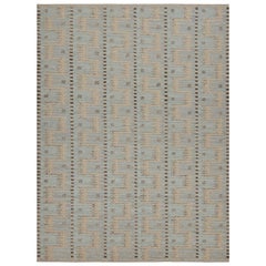 Rug & Kilim’s Scandinavian Rug in Blue With Geometric Patterns