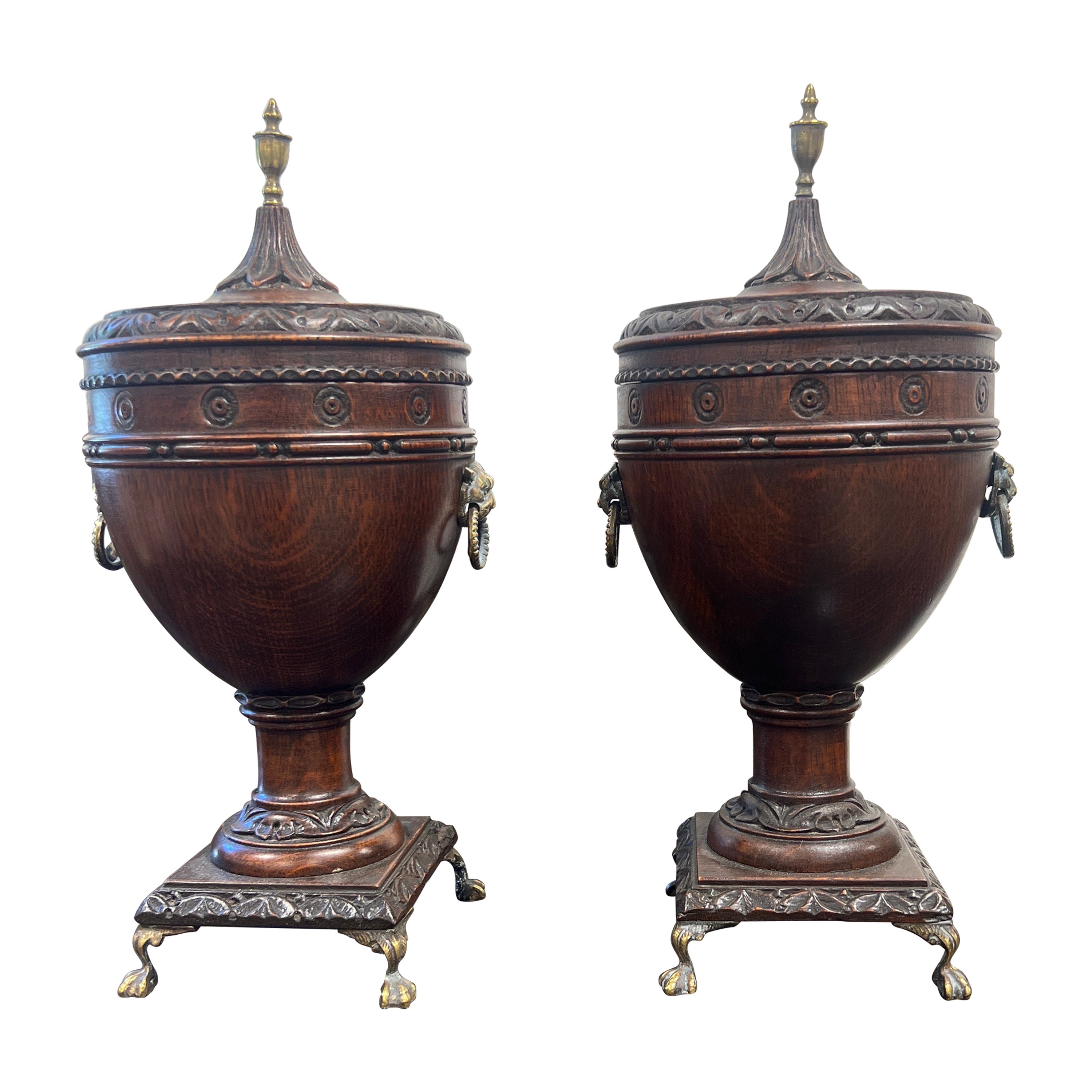 Pair, 19th Century Regency Brass Lion Mounted Lidded Oak Urns For Sale