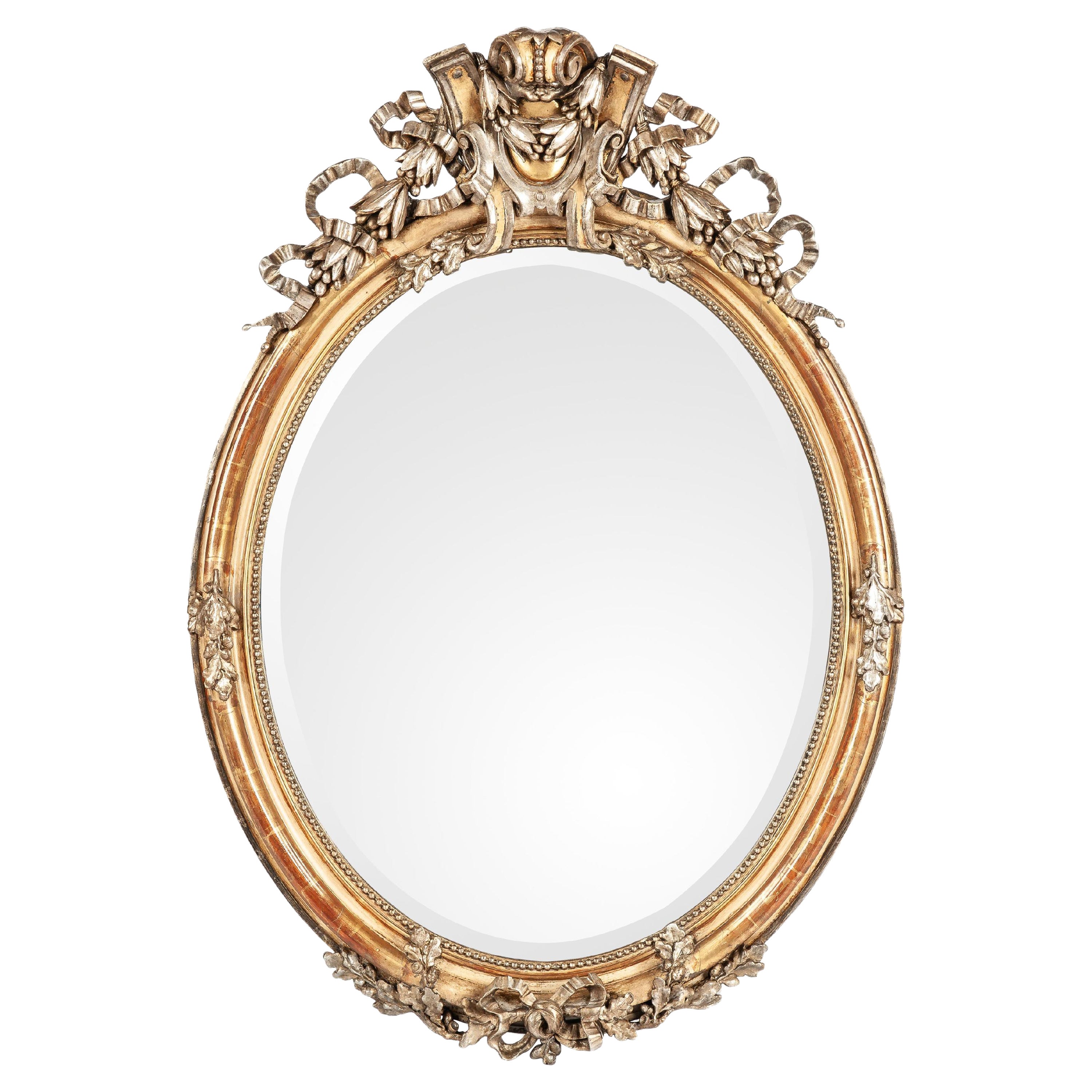 Antique 19ème siècle grand miroir ovale français doré à la feuille d'or et d'argent en vente