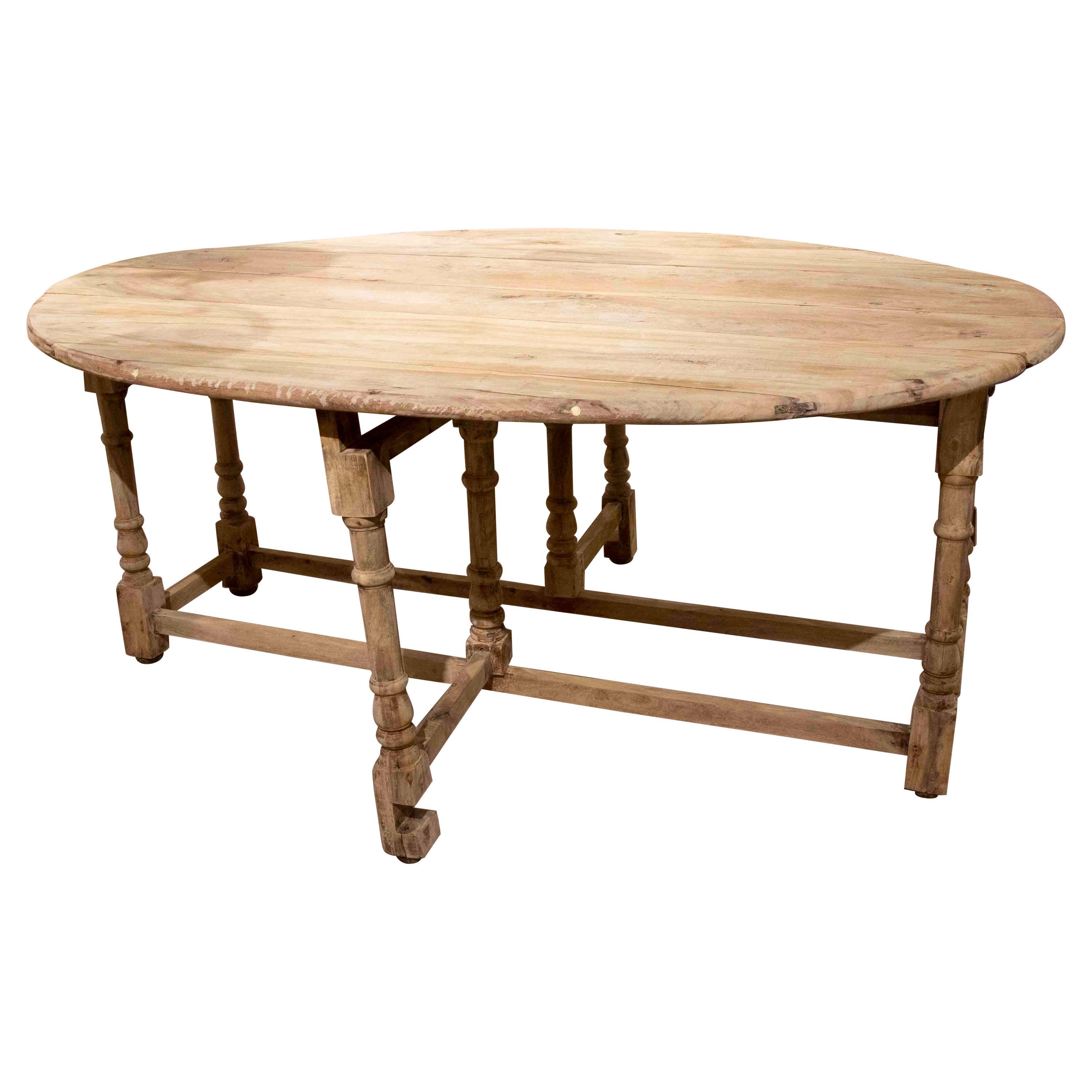 1950s Spanish Wooden Oval Wing Table with Turned Legs For Sale