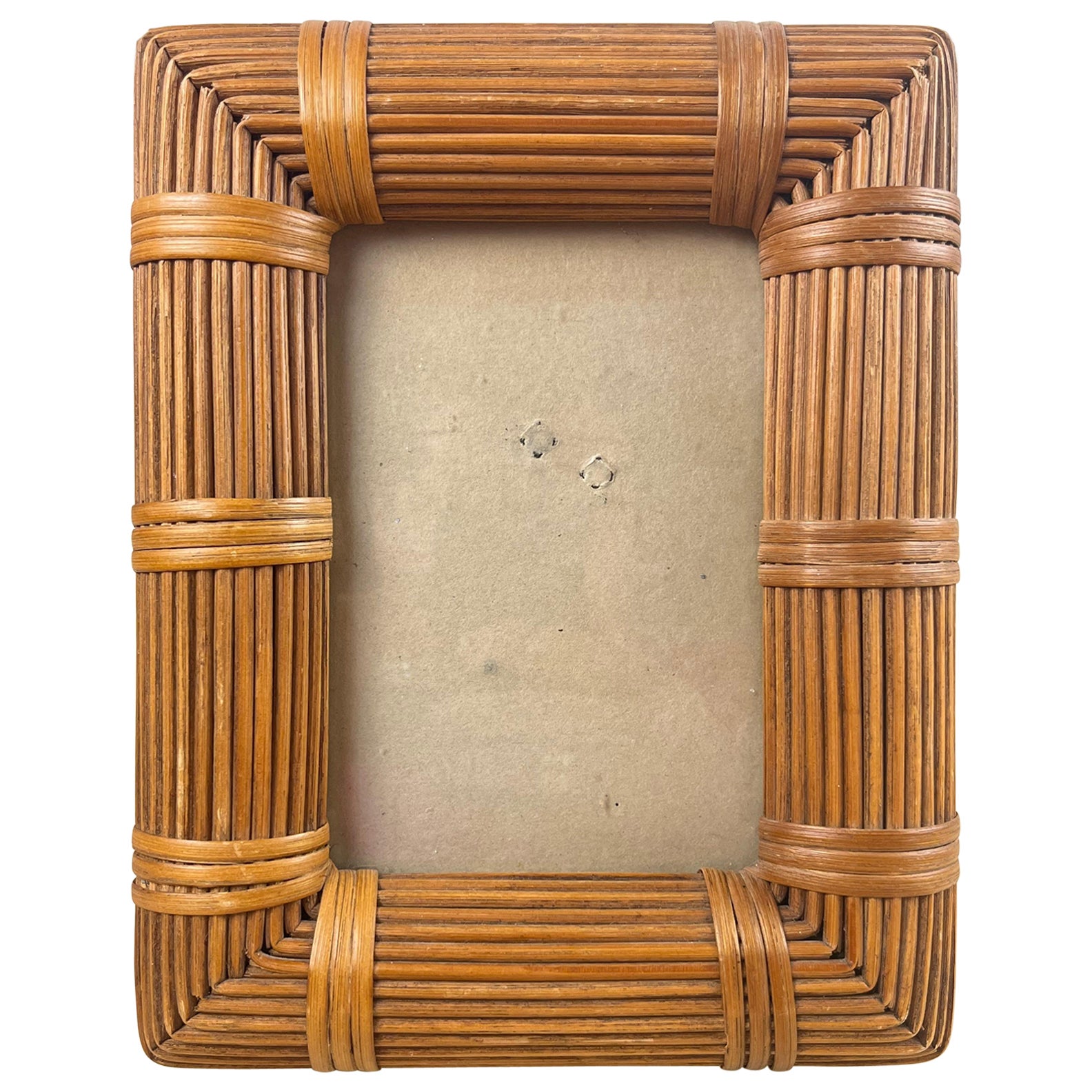 Rattan photo frame, Italy, 1970s
It belonged to my grandparents and is intact. Small signs of aging. Good conditions.
The external measurement is 19cm wide x 25cm high. The internal measurements are 10cm x 15.5cm.