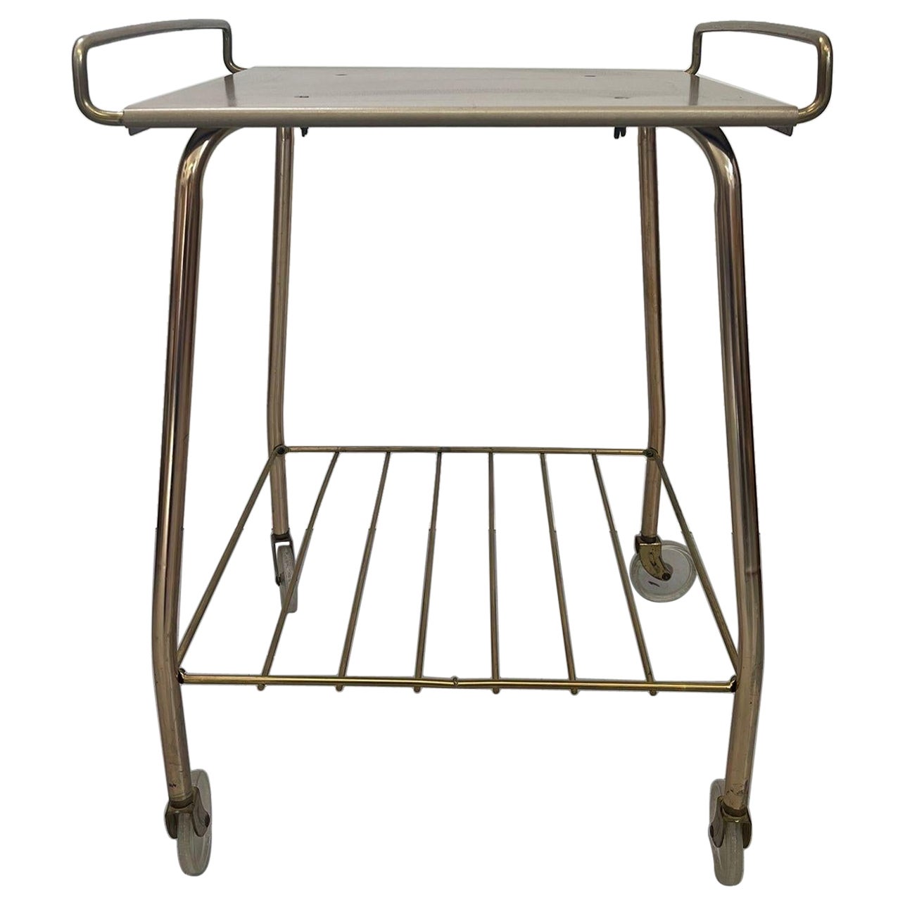 Chariot vintage couleur or sur roues