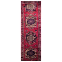 Antique Turkish Runner in a Geometric Pattern in Red, Navy, Green, Blue, Ivory