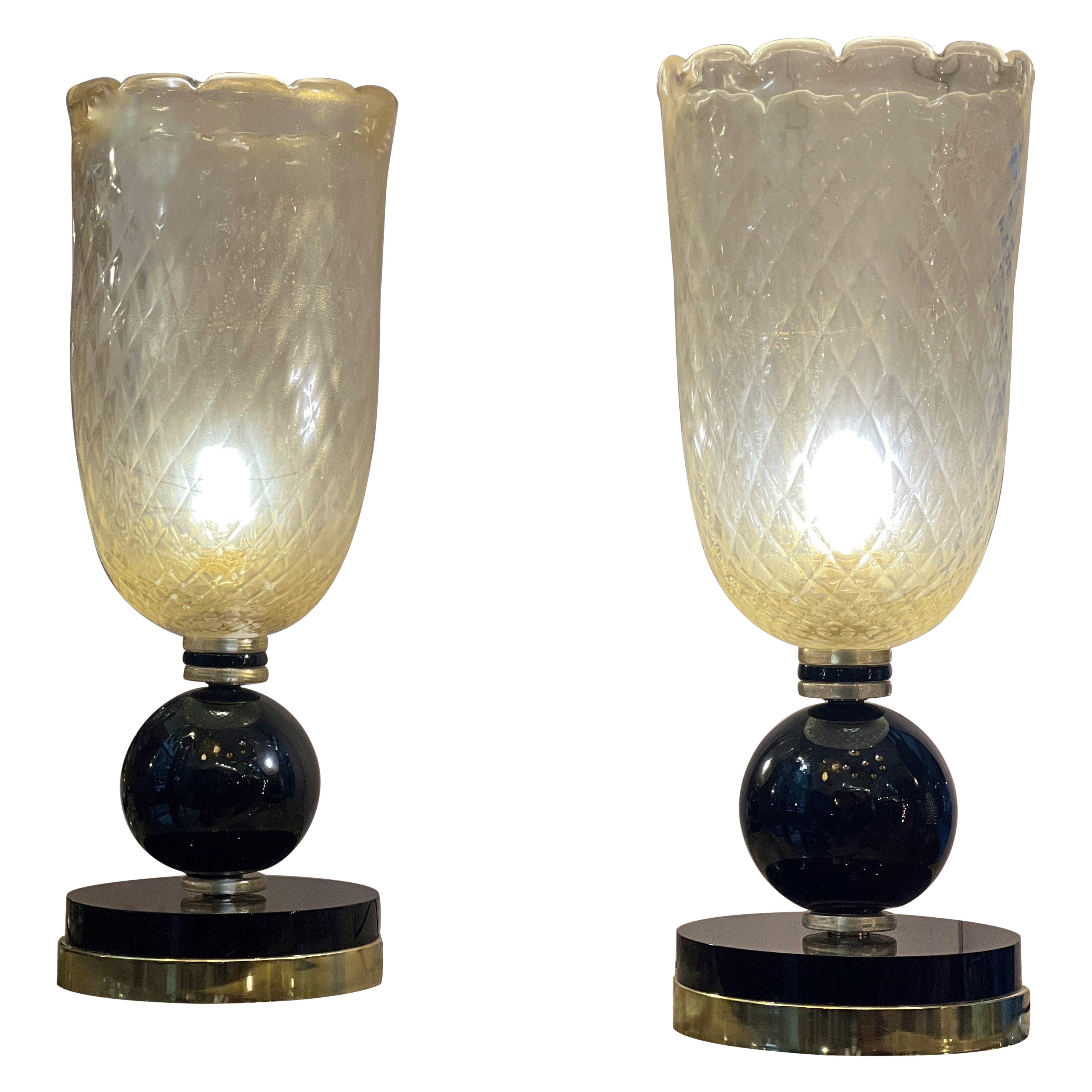 Coppia di lampade in vetro di Murano oro con base nera, 1940 For Sale