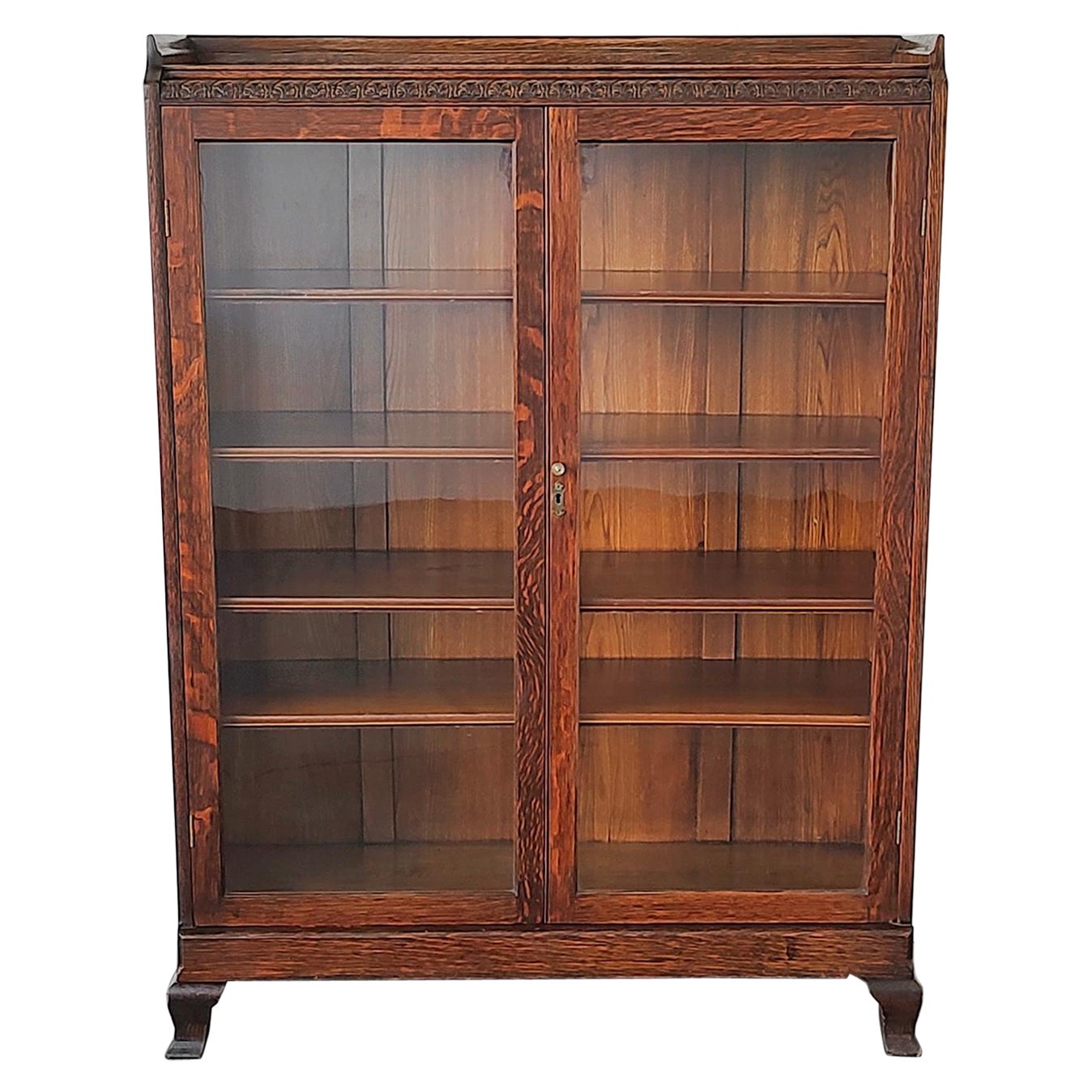 Antique Tiger Oak Glass Curio Cabinet by Rockford Chair & Furniture Co. For Sale