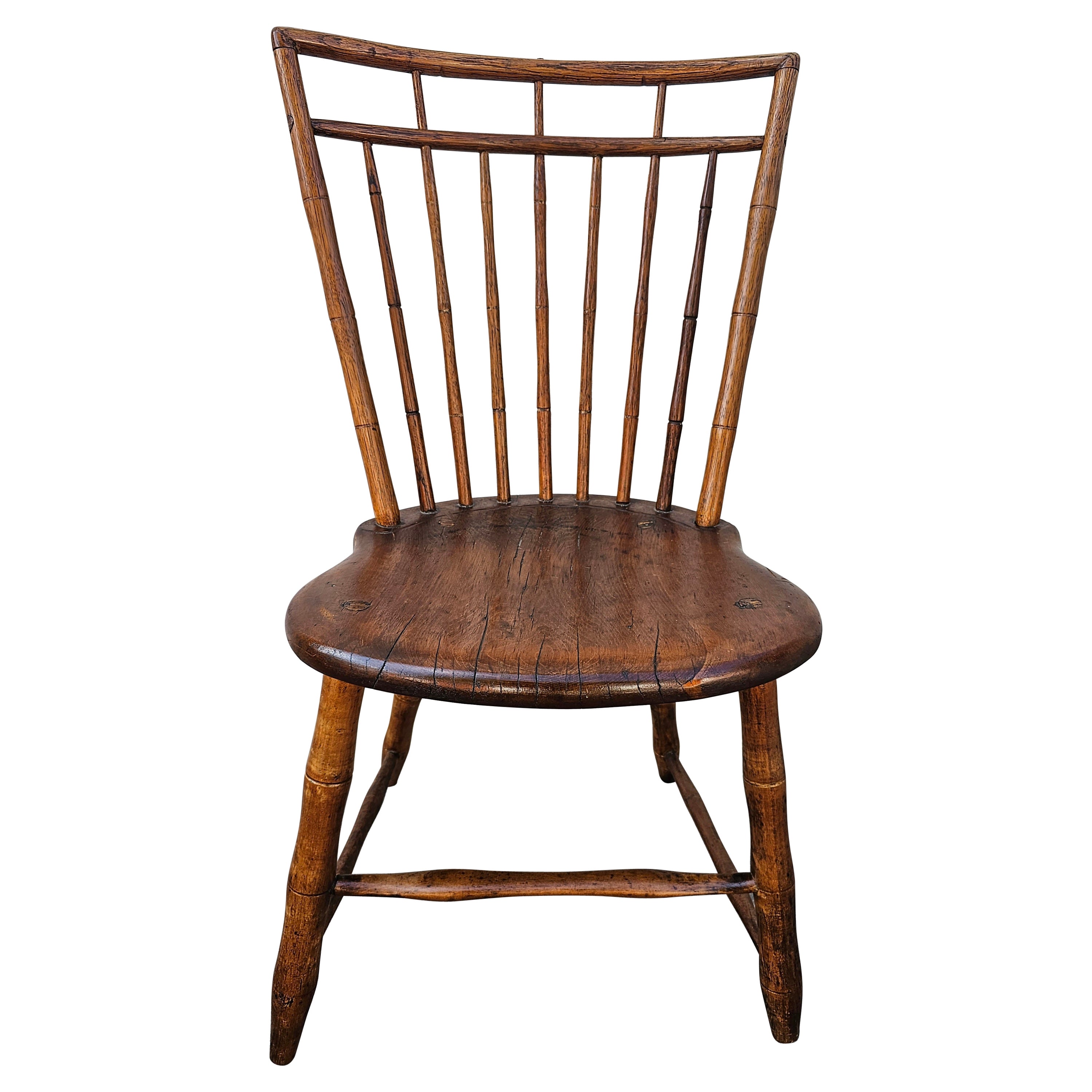 19th Century Early American Elm Windsor Plank Chair For Sale