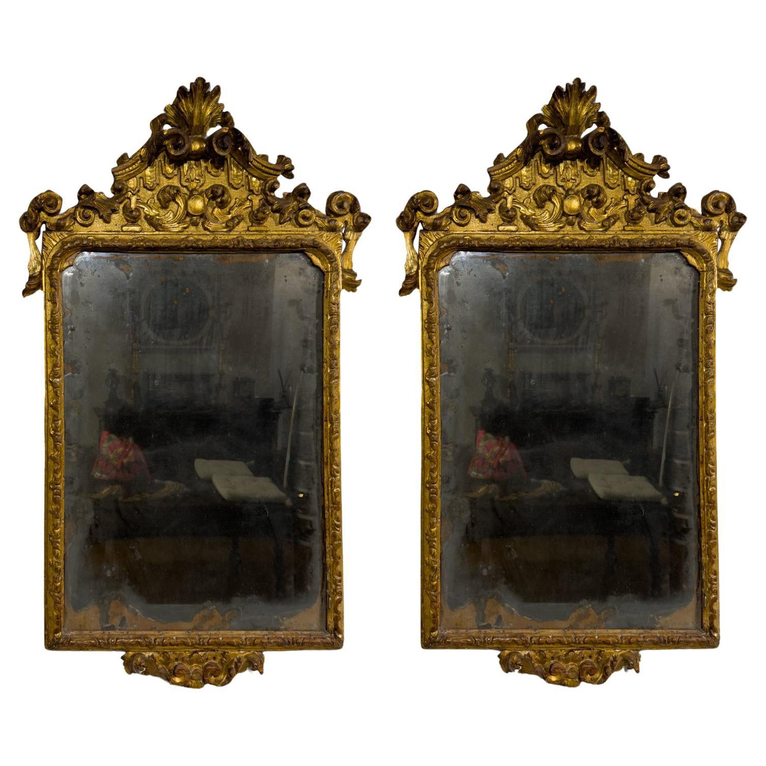 FIRST HALF OF THE 18th CENTURY CARVED AND GILDED WOODEN MIRRORS