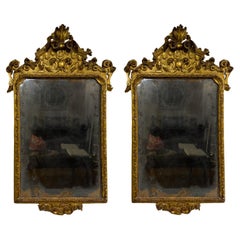 FIRST HALF OF THE 18th CENTURY CARVED AND GILDED WOODEN MIRRORS