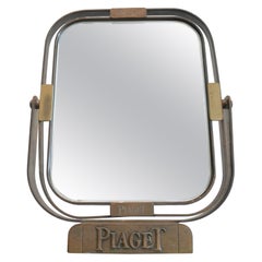 Miroir de table en laiton pour la marque de montres suisses de luxe Piaget, vers les années 1960