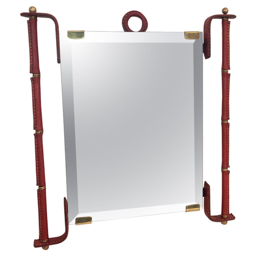 1950's Stitched leather wall mirror by Jacques Adnet For Sale