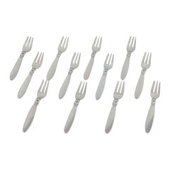Georg Jensen, Cactus, set of twelve sterling silver cake forks.