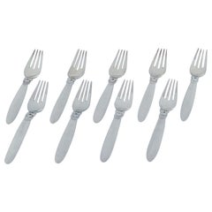 Vintage Georg Jensen, Cactus, set of nine sterling silver dinner forks. 