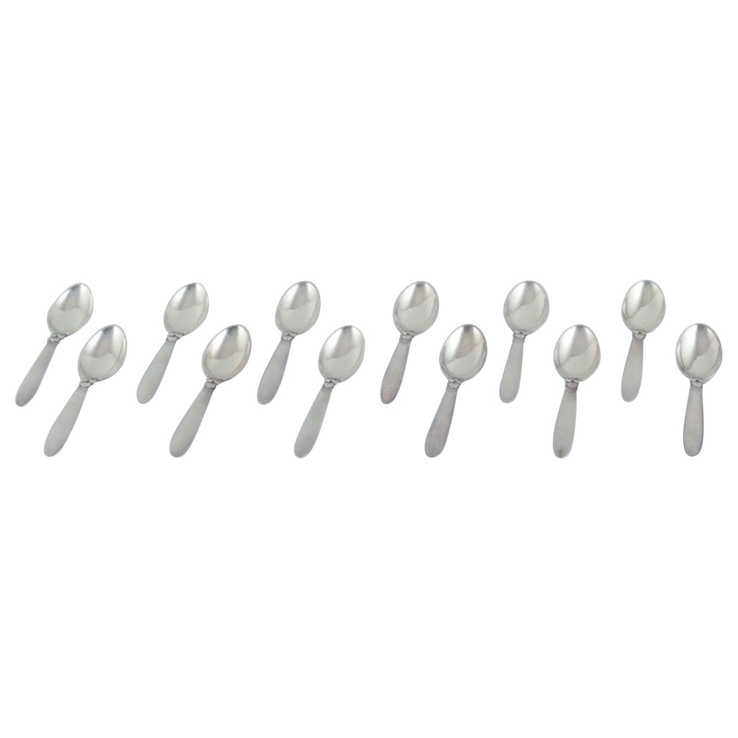 Georg Jensen, Kaktus, set of twelve sterling silver dessert spoons. For Sale