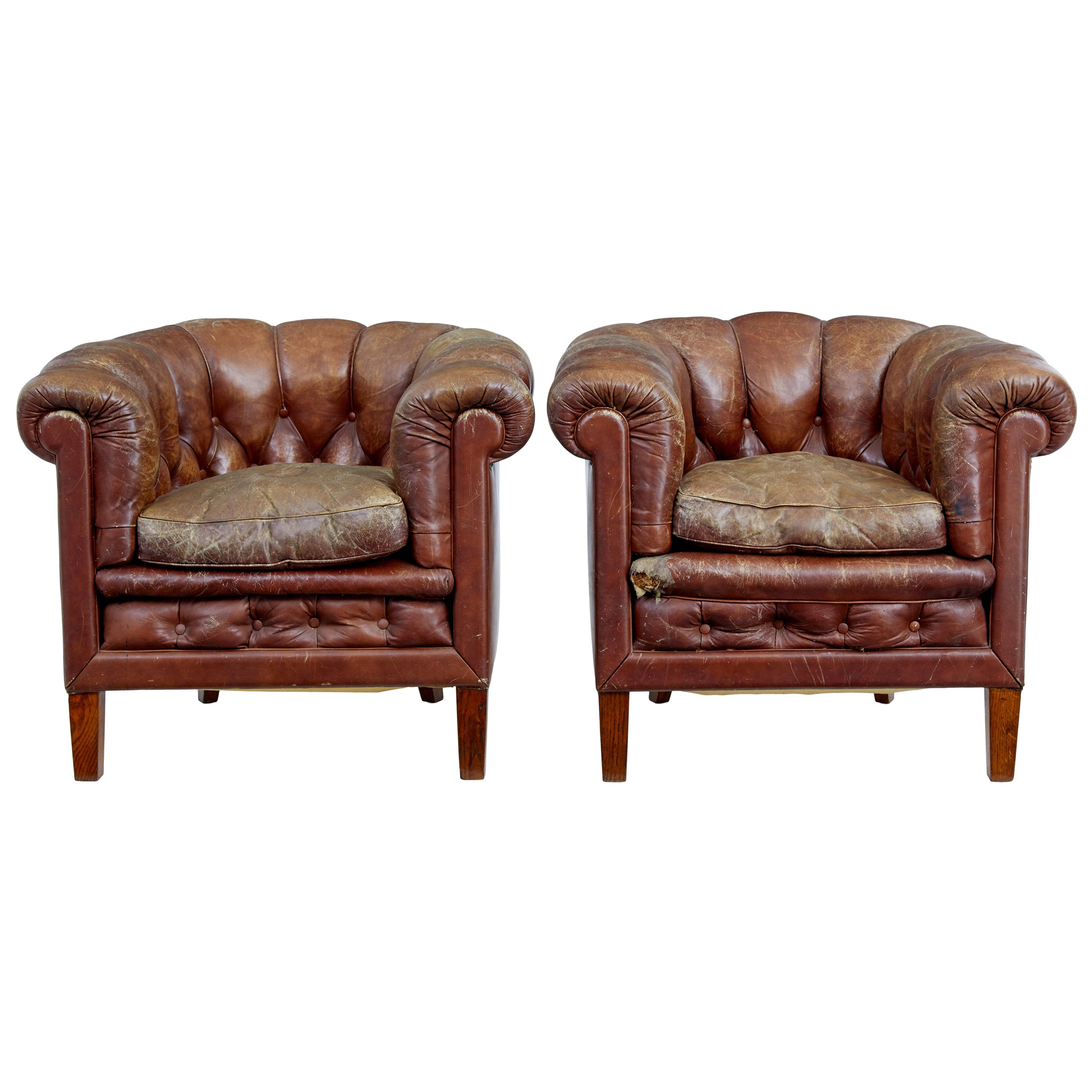 Pair of early 20th Century leather lounge armchairs For Sale
