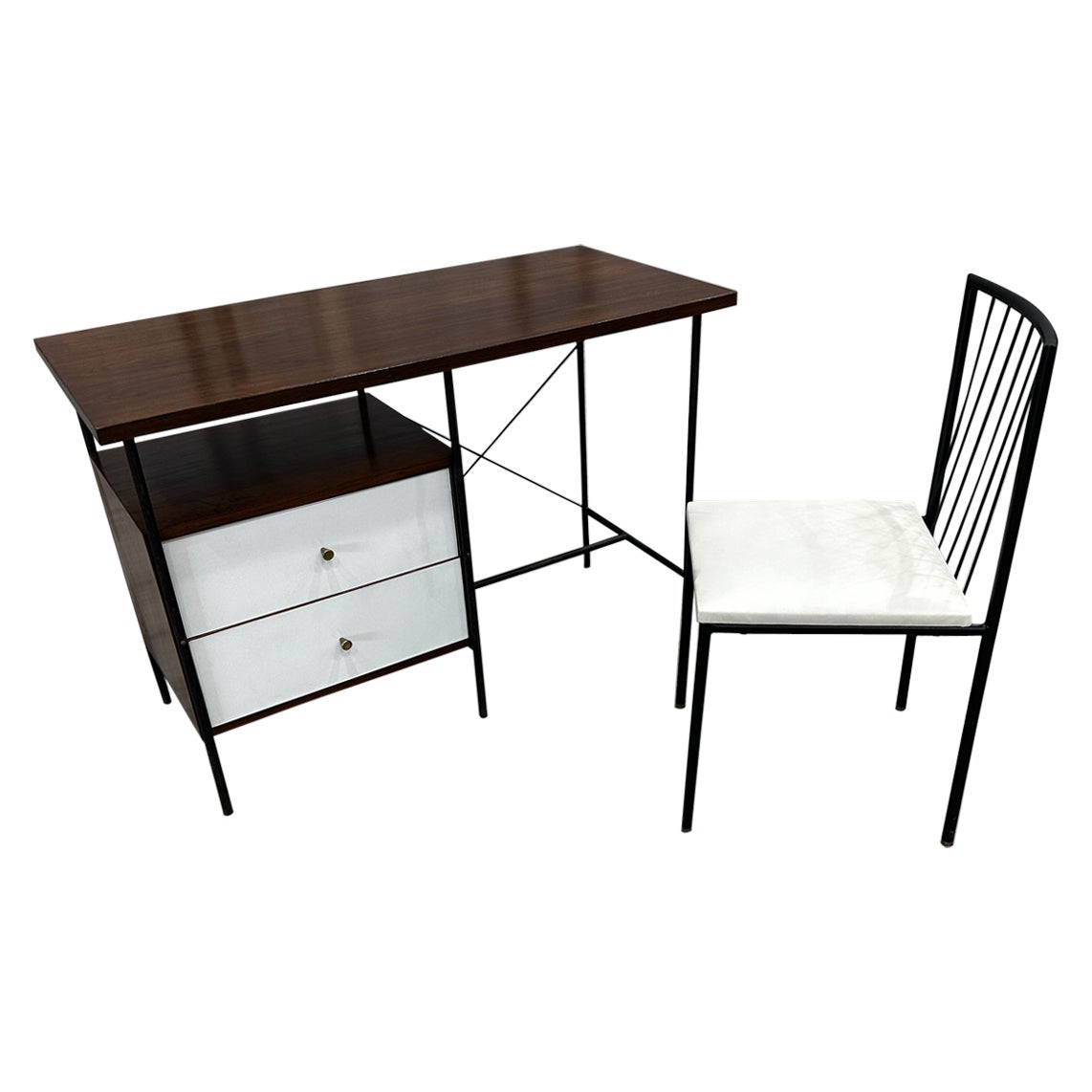 This Brazilian Modern desk and chair set by Geraldo de Barros for Unilabor is nothing less than spectacular. 

The desk is made with Brazilian rosewood (also known as jacaranda) and iron. The tabletop is made with Brazilian rosewood and is supported