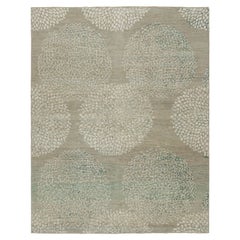 Alfombra moderna de Rug & Kilim en beige y gris, con motivos geométricos