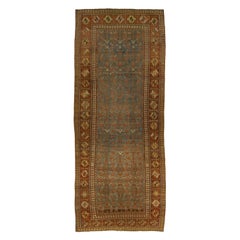 Tapis de couloir persan antique Bidjar en laine bleu avec motif floral sur toute la surface, années 1900