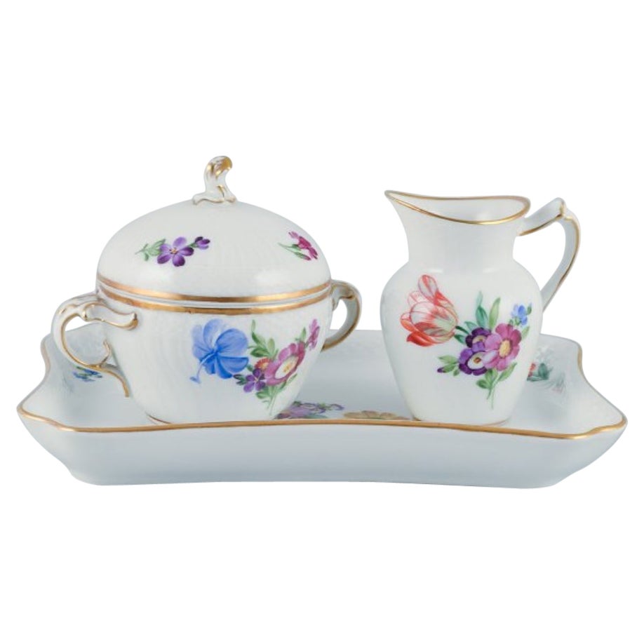 Royal Copenhagen, Saxon Flower, porcelain sugar bowl and creamer on tray For Sale