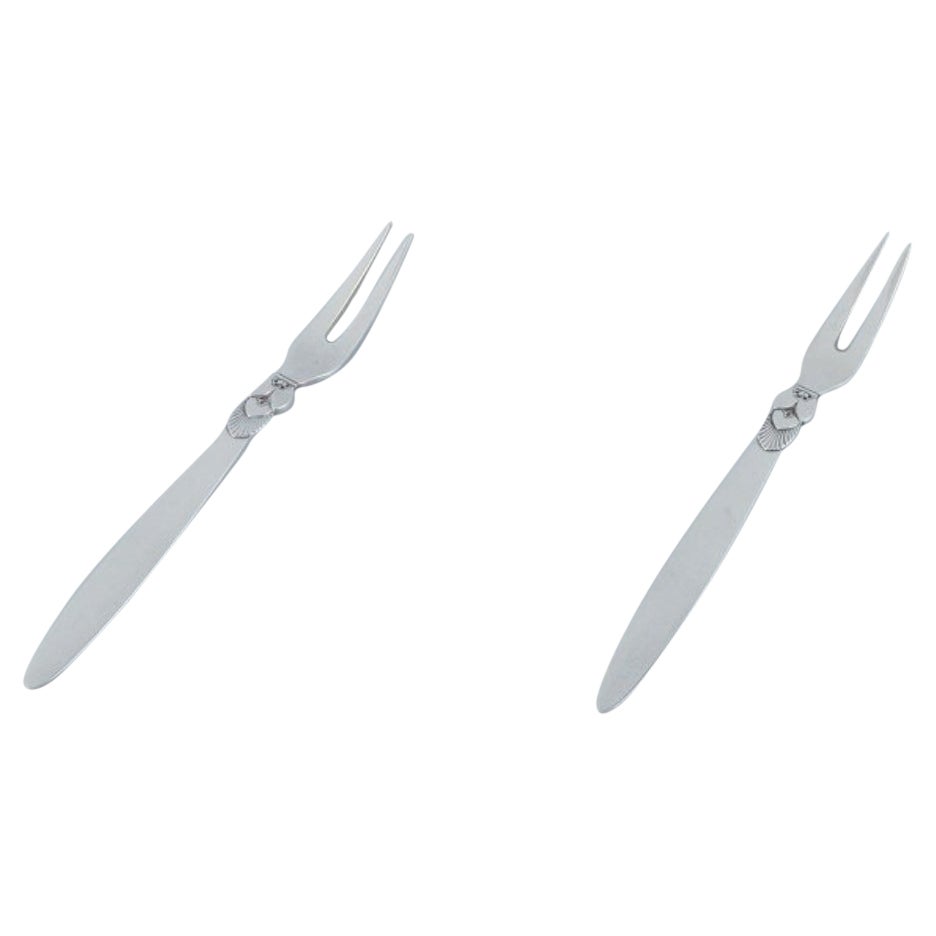 Georg Jensen, Cactus, two sterling silver appetizer forks/herring forks. 